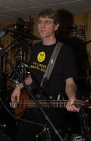 It was the mid-seventies and many of Allen's friends had purchased their first guitars, but they had no one to provide those sweet low notes. Soon Allen's friend Greg marched him off to the music store, loaned him the money, and bought him his first bass. "It was a red hollow body Epiphone and the strings were about an inch off the fretboard at the seventh fret." Perfect for building up hand strength! Nobody seemed to care if Allen had learned to play the darn thing yet "just come over and jam". Click Here