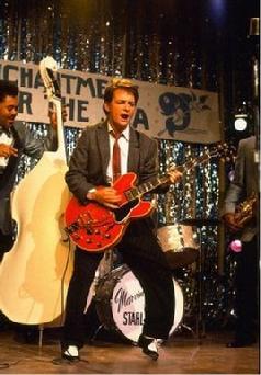 Michael J. Fox playing "Johnny B. Goode"  In Back to The Future ~ Click Here
