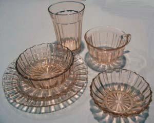 The pattern called Avocado (also known as Sweet Pear) was the first Depression Glass Pattern. It was made by Indiana Glass Company from 1923 to 1933.